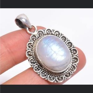Brand new solid 925 sterling silver handmade rainbow moonstone pendant.